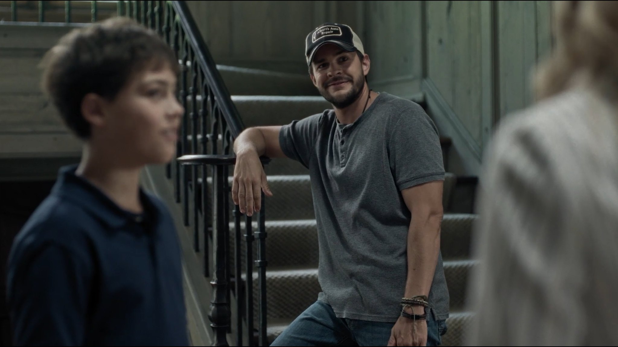 Last Shot — Caden and his father on the stairs